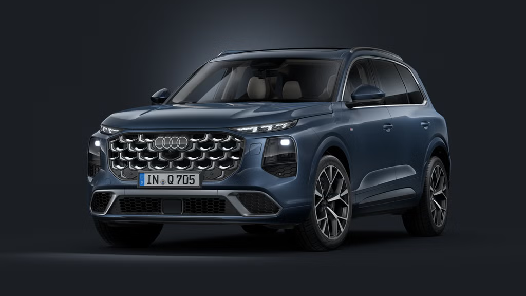 Šikmý pohľad spredu na SUV Audi Q7 na tmavom pozadí.