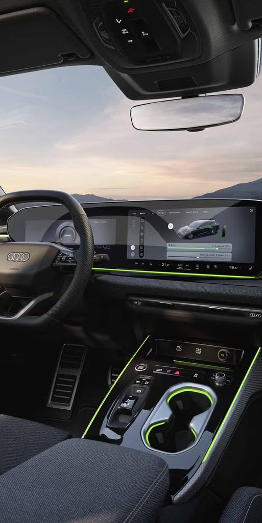 Nahaufnahme des MMI-Displays im A6 Avant e-hybrid. Auf diesem wird der aktuelle Ladezustand sowie ein Slider zur Regelung der Reserve angezeigt.