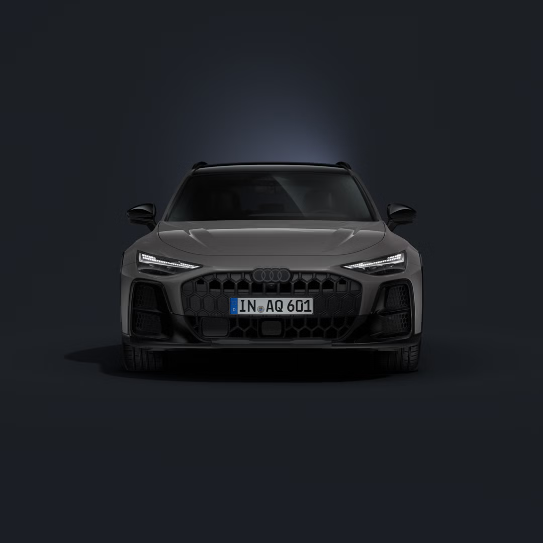 Audi A6 allroad spredu na tmavom pozadí.