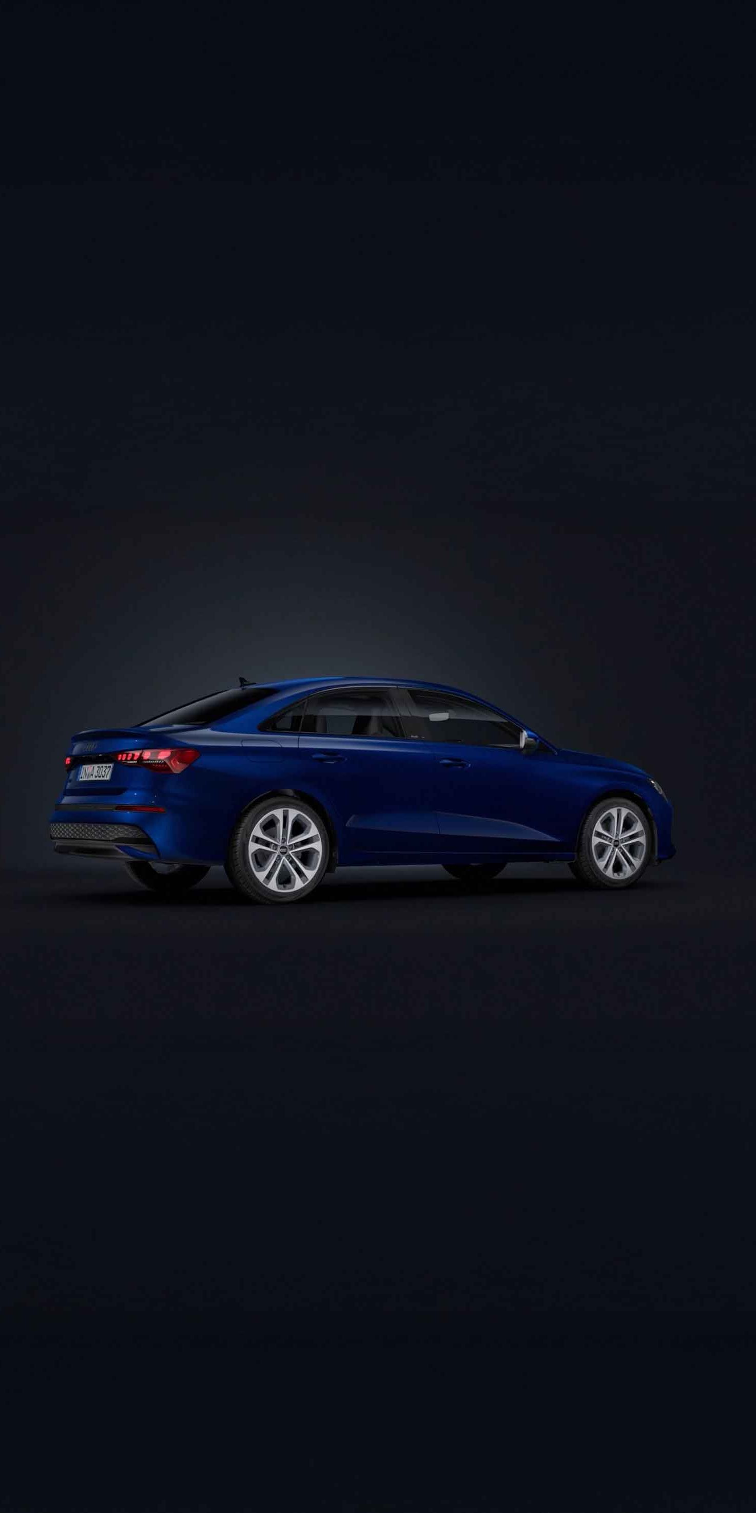 Audi A3 Limuzína na tmavom pozadí.