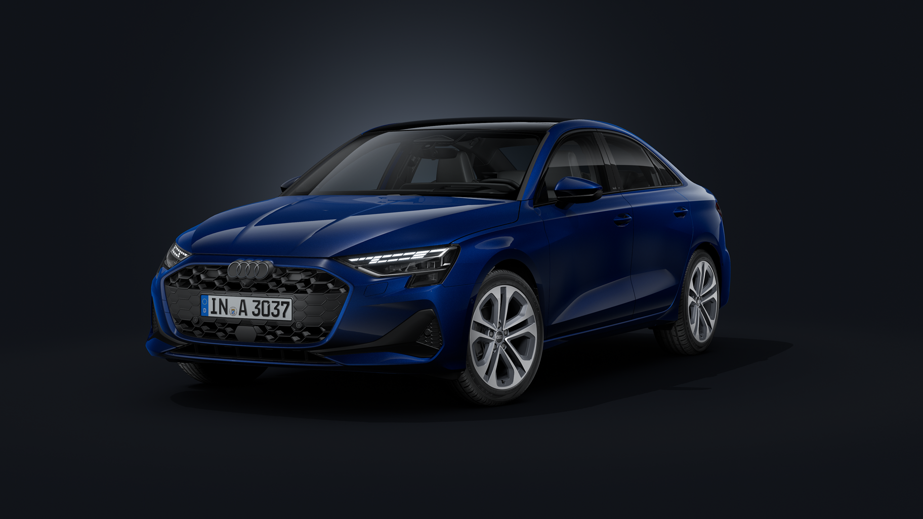 Audi A3 Limuzína z prednej strany na tmavom pozadí.