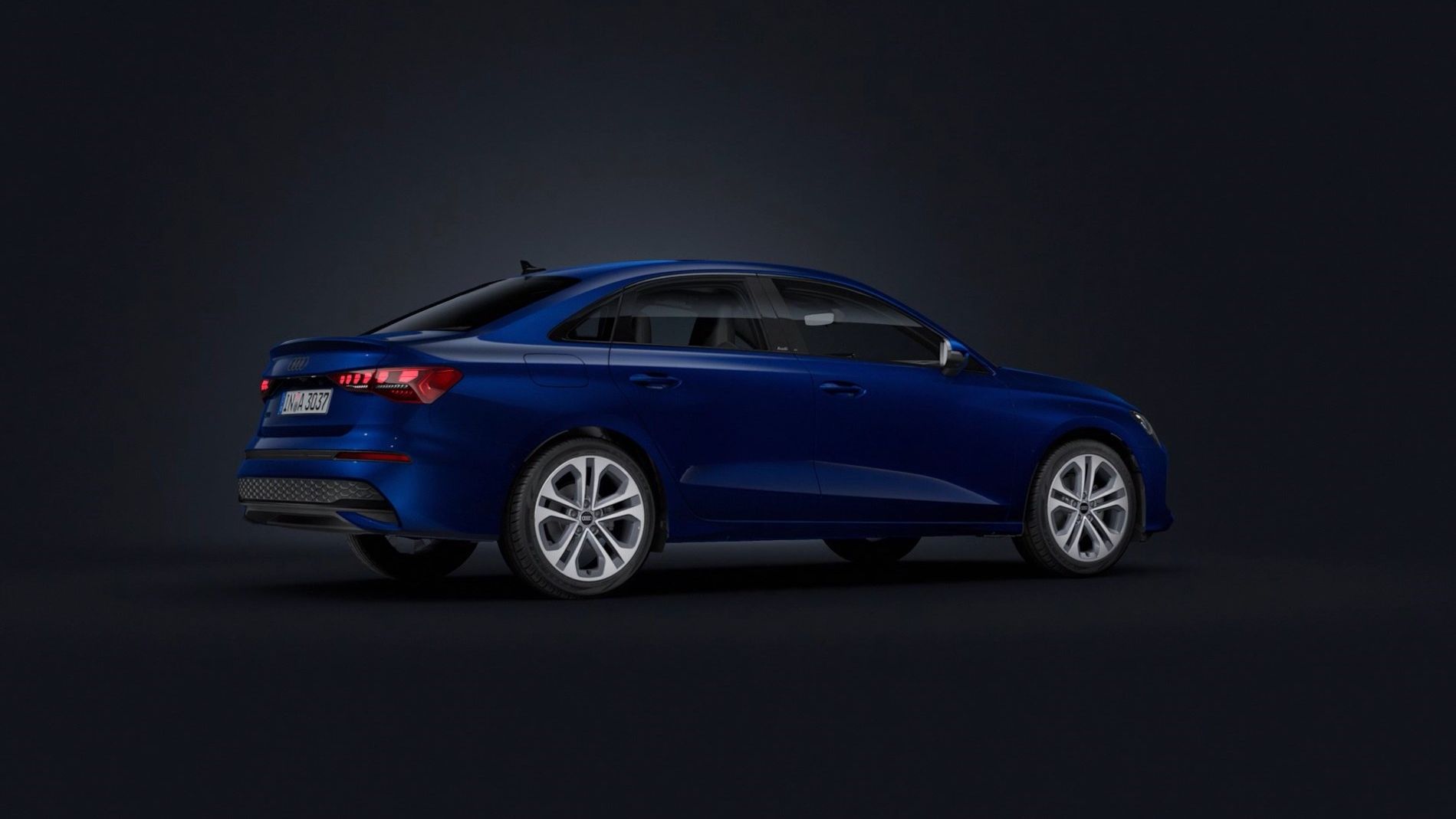 Audi A3 Limuzína na tmavom pozadí.
