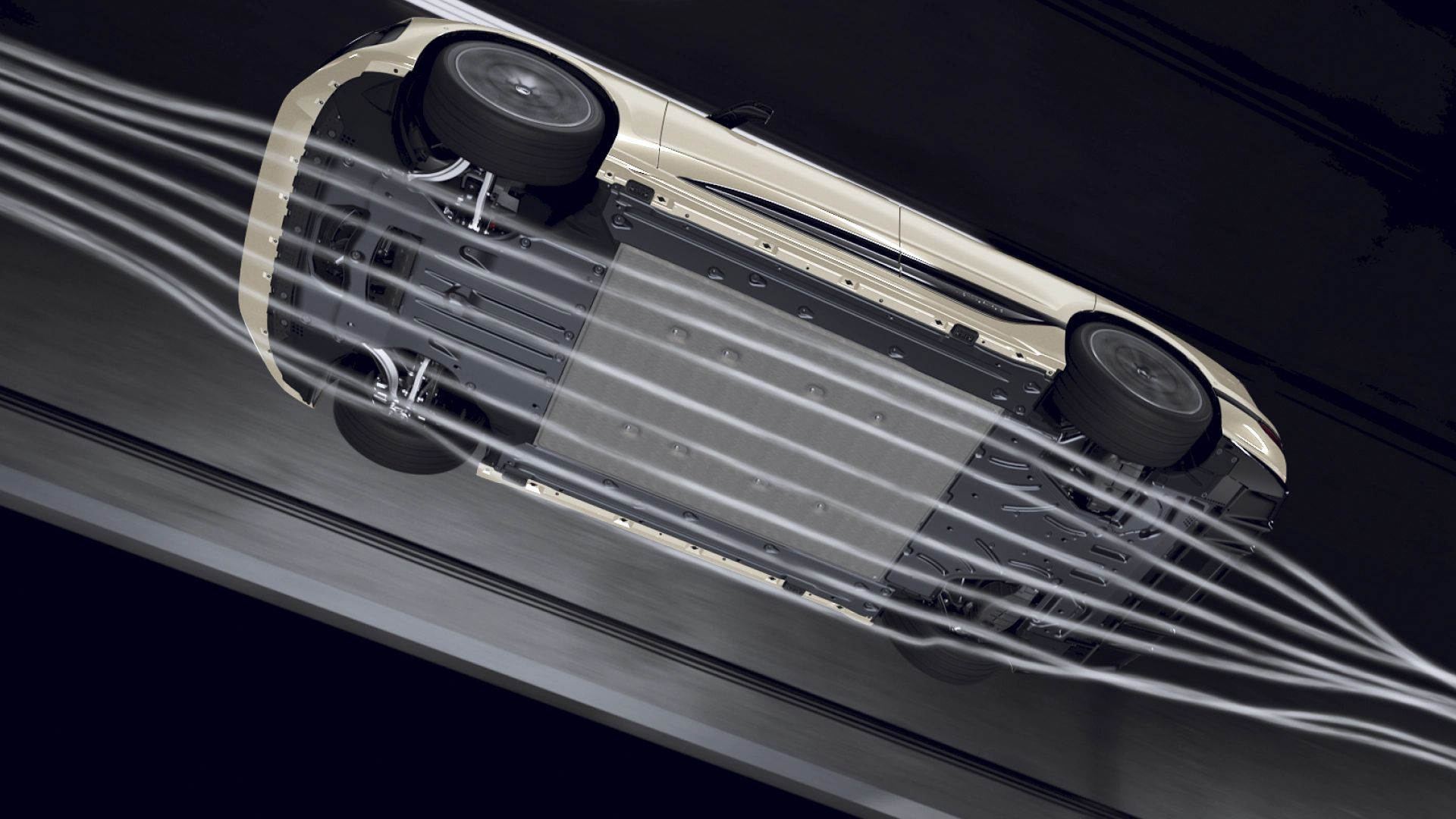 Pohľad zdola na automobil s detailom na jeho aerodynamické vlastnosti. Biele čiary znázorňujú prúdenie vzduchu pod vozidlom. Automobil má vertikálny tvar a vidno jeho dve kolesá.